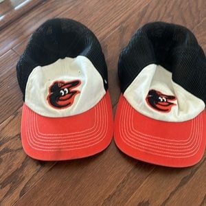 Two children’s Orioles hats, both the same, one size stretch fit (both included)